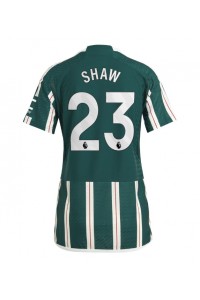 Manchester United Luke Shaw #23 Jalkapallovaatteet Naisten Vieraspaita 2023-24 Lyhythihainen